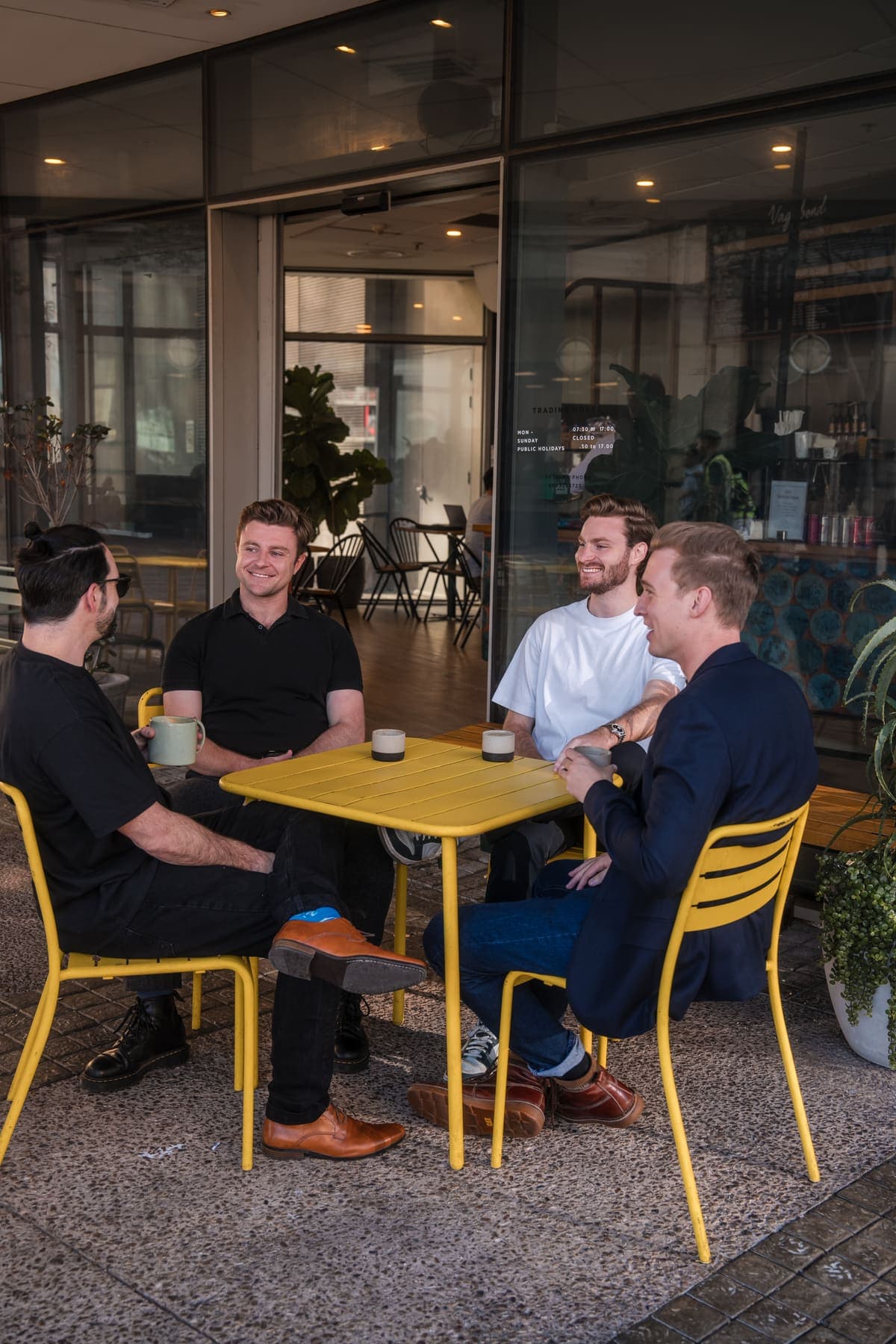 The Unyfy team around a table